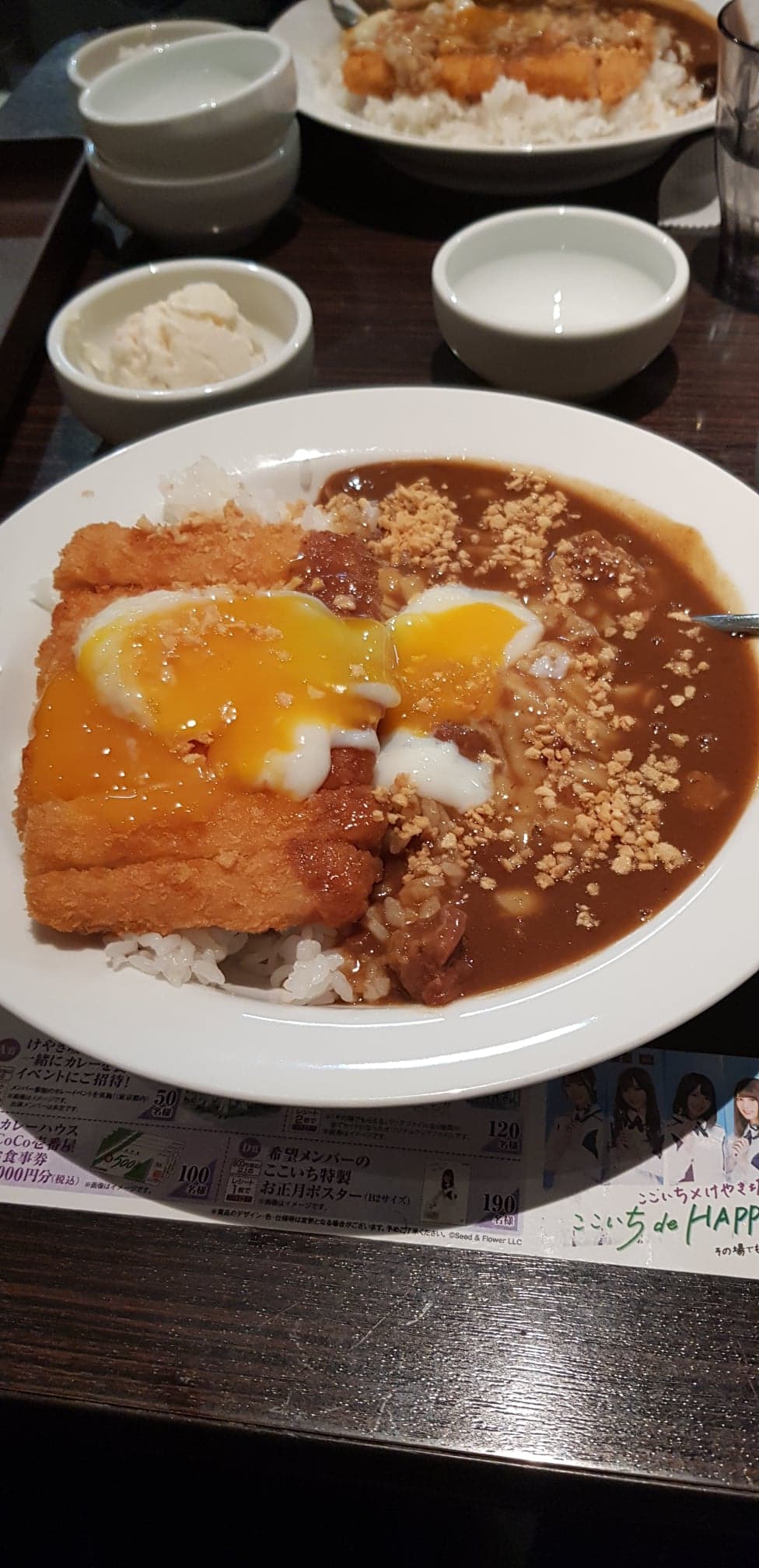 Delicious chicken katsu curry with egg and garlic topping at Coco Ichibanya.