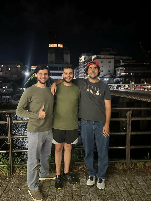 Reuniting with old friends on a beautiful evening at Kyoto's Kamo River.