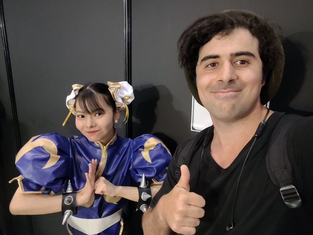 Posing with a Chun-Li cosplayer at EVO Japan 2025.