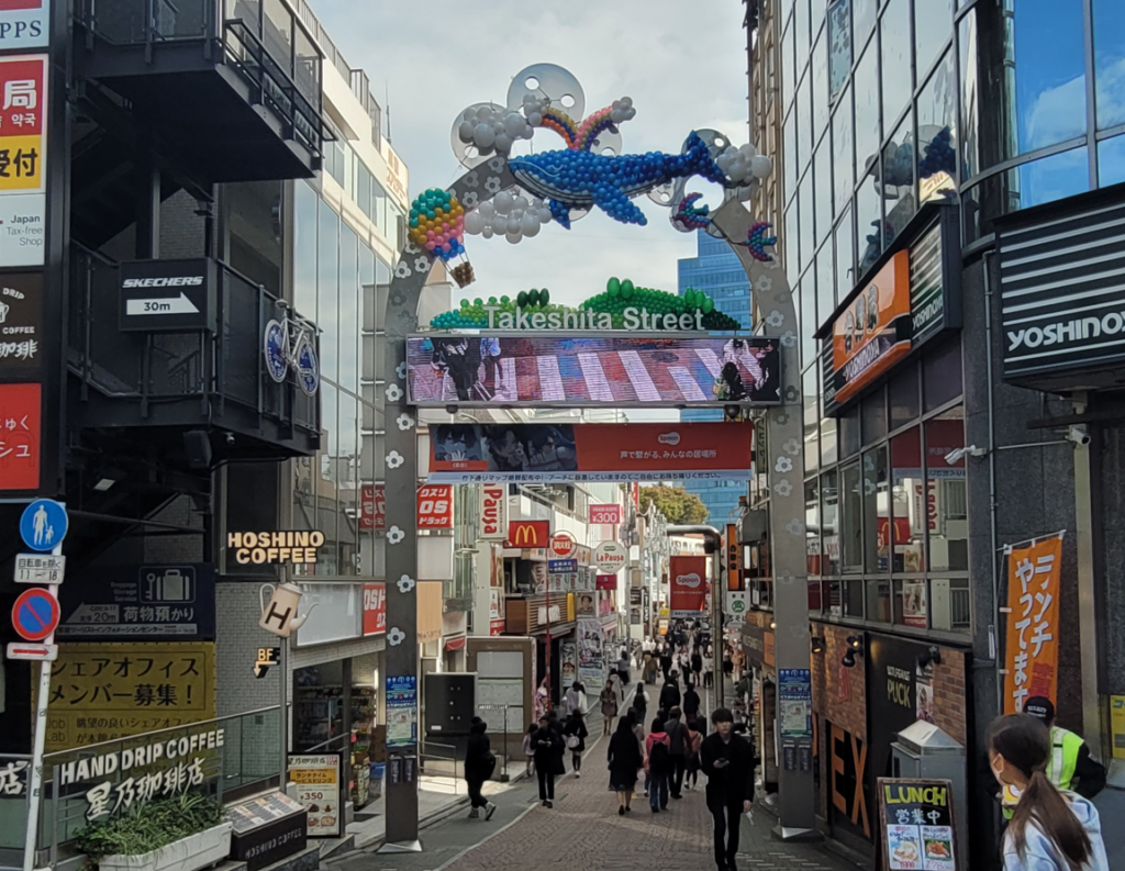 High schoolers walking and shopping at Takeshita Street, Harajuku.